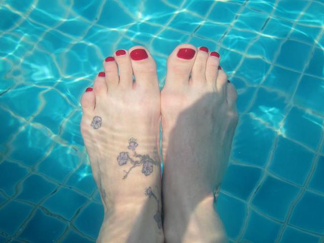 Red polish on Southport foot goddes